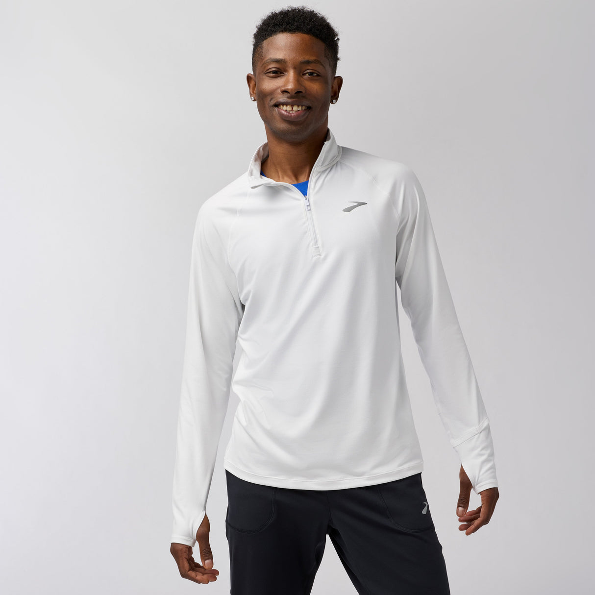 Brooks Men's Dash 1/4-zip pullover running top with long sleeves in white