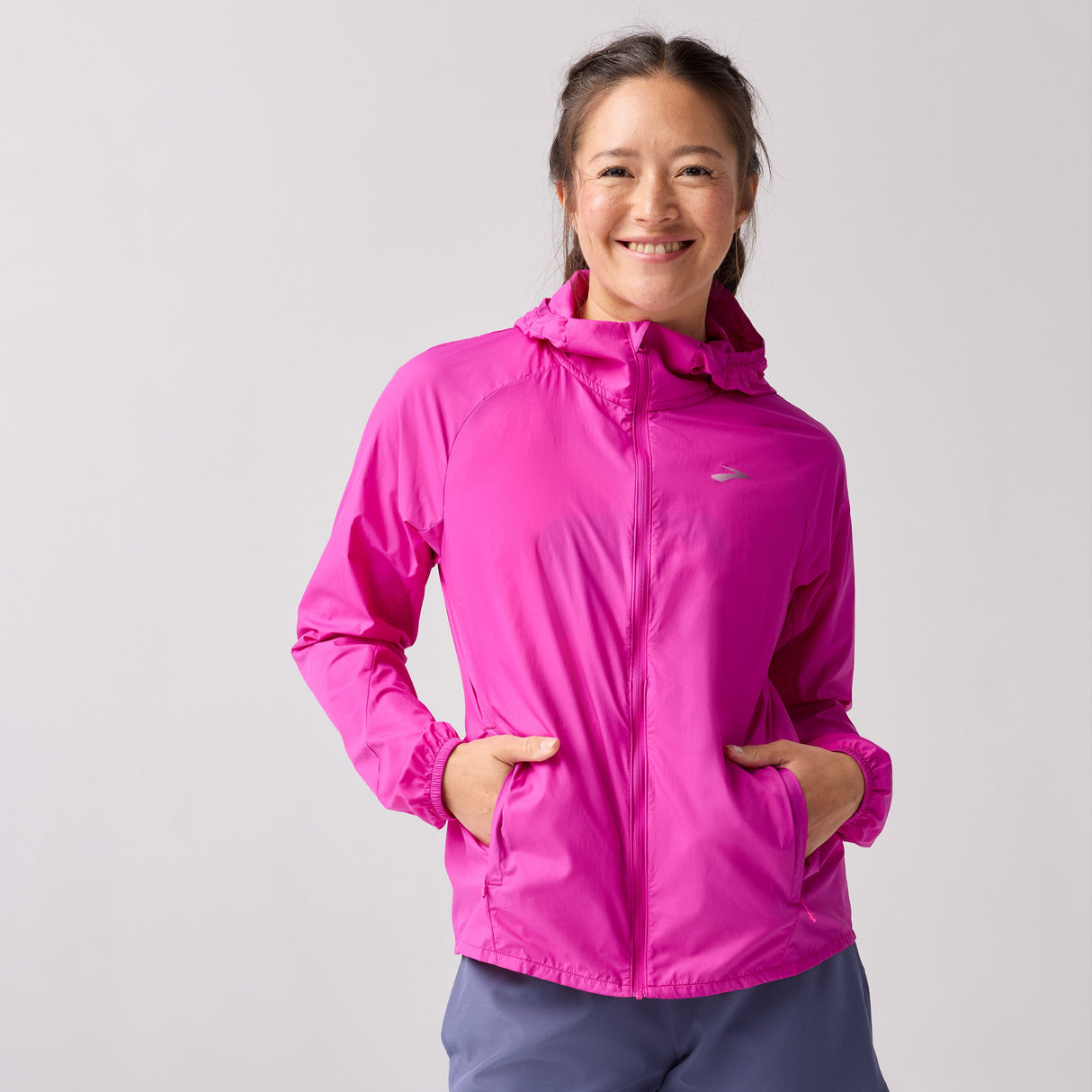 Brooks women's Packable Canopy Jacket lightweight rain resistant shell for running