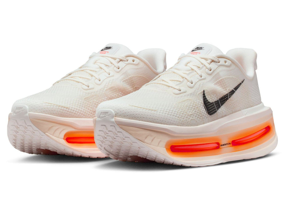 Nike Men's Vomero Premium maximum cushioning road running shoe in white and orange