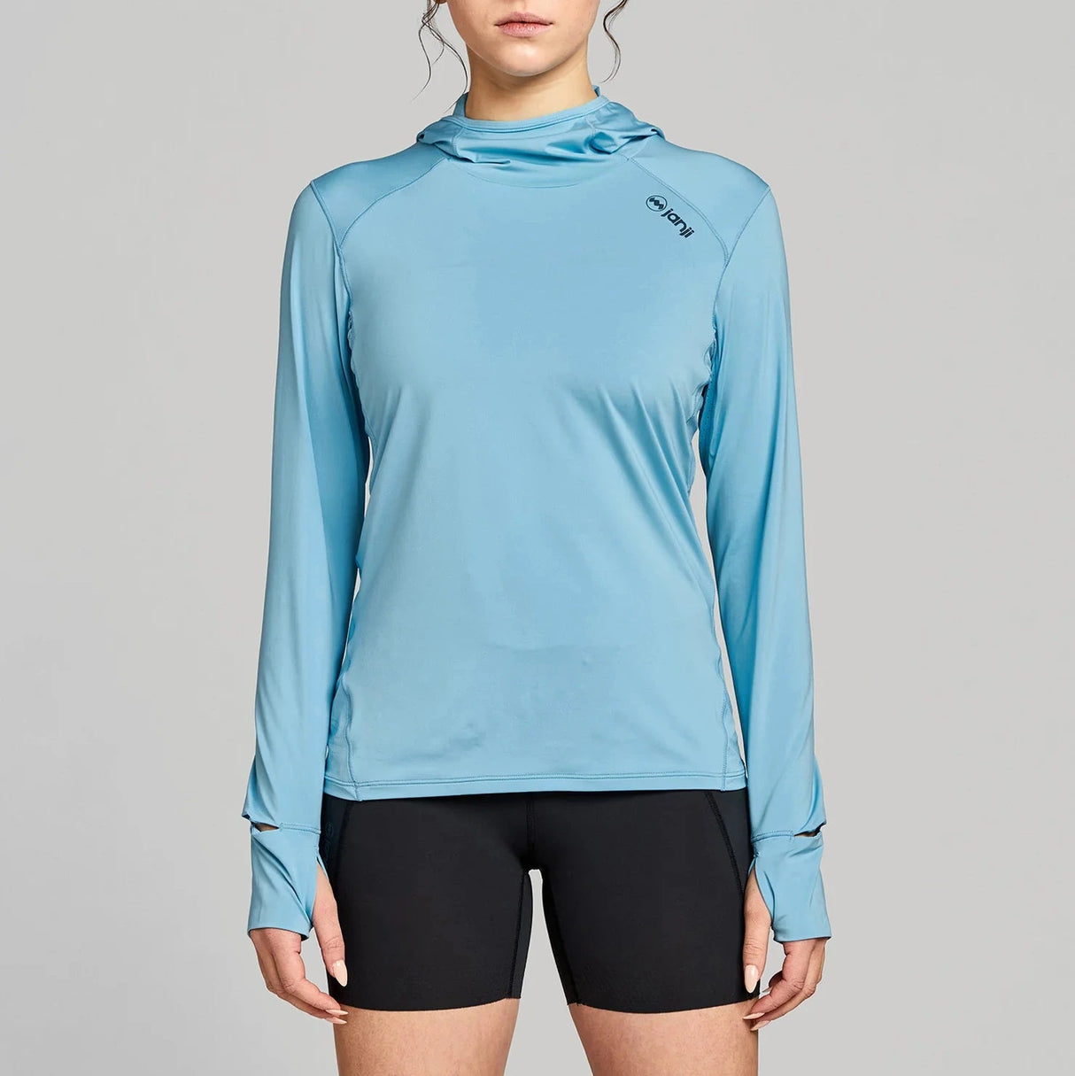 Janji Women's Sunchaser 50 Hooded Long Sleeve lightweight running top that provides sun protection
