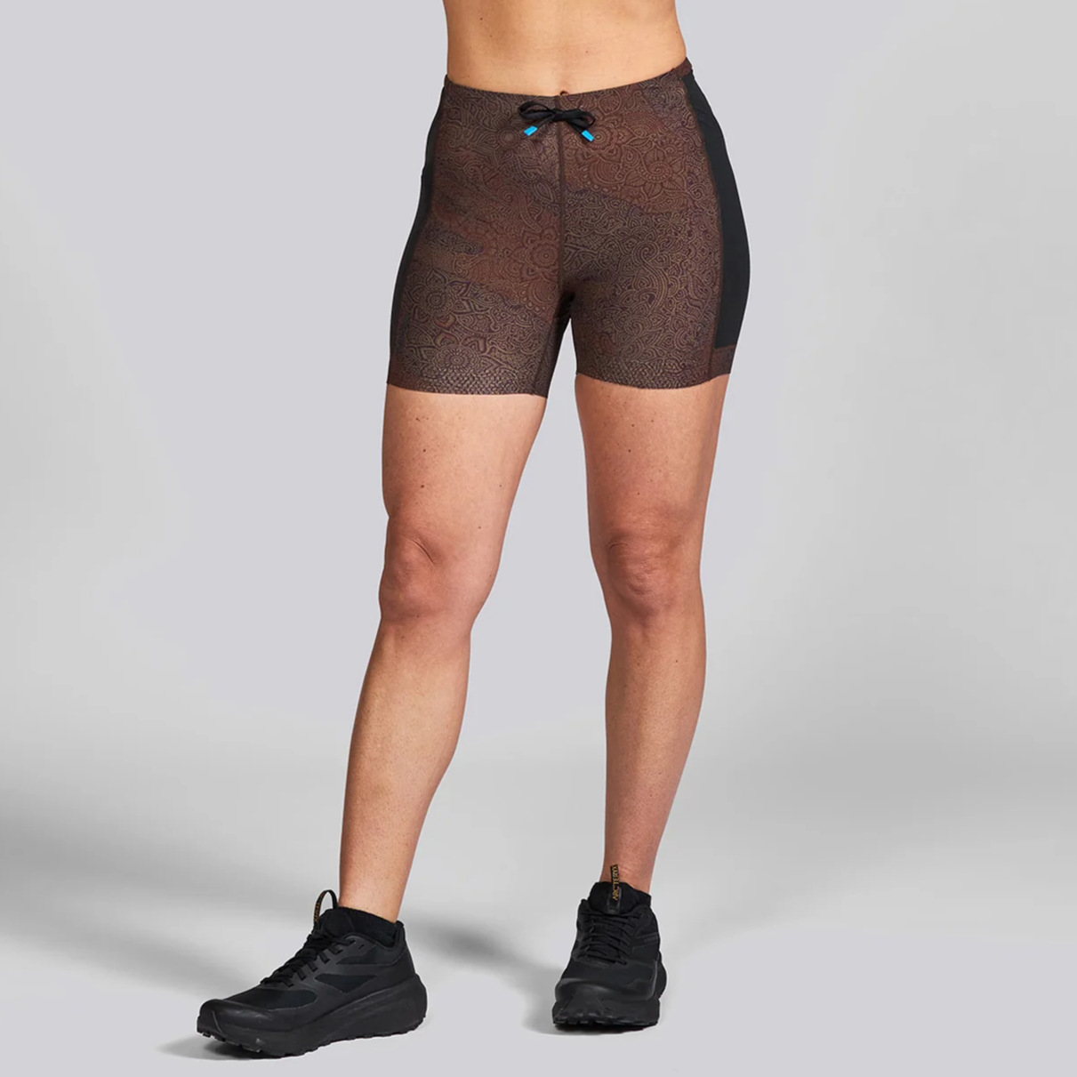 Janji Women's 4" Trail Short tight short with drawstring waistband and pockets