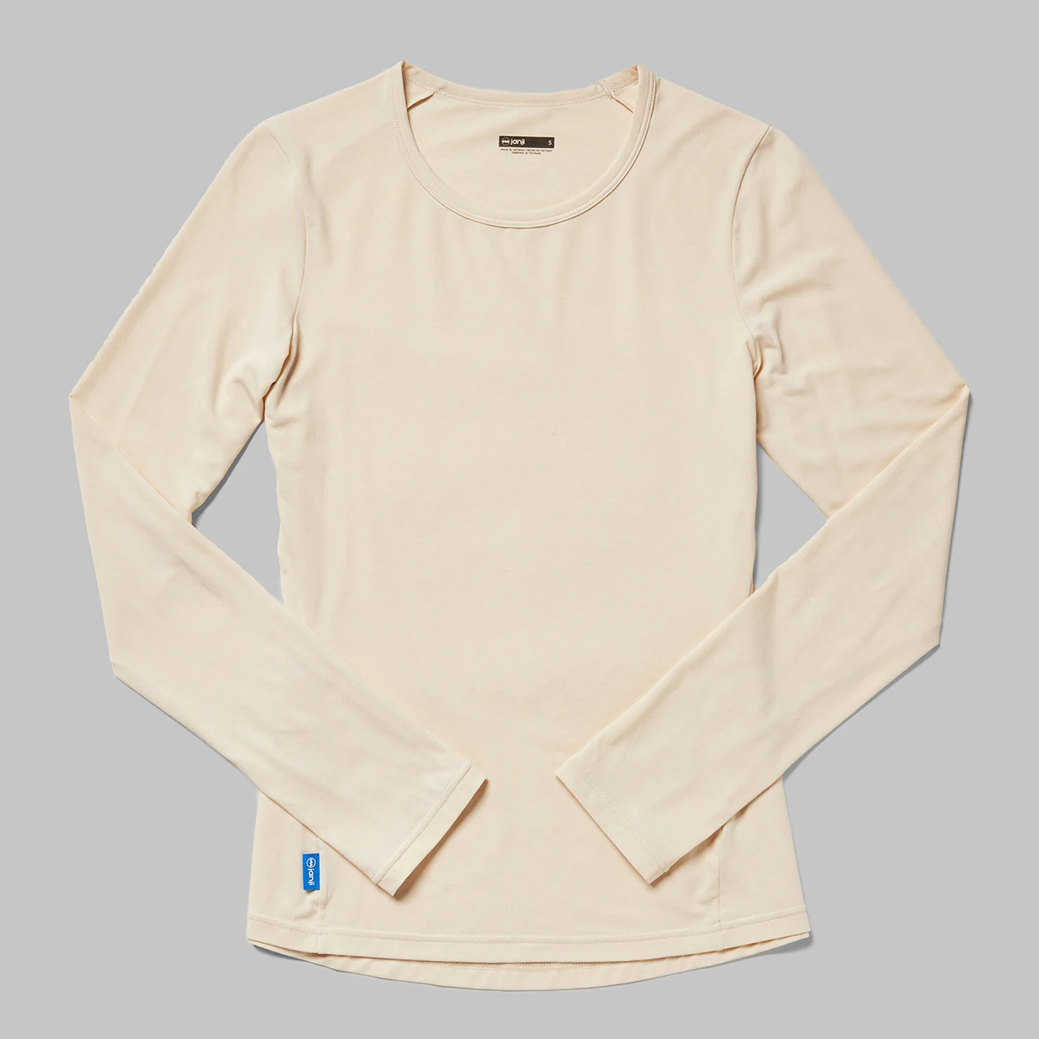 Janji women's circa daily long sleeve running shirt in moonglow color