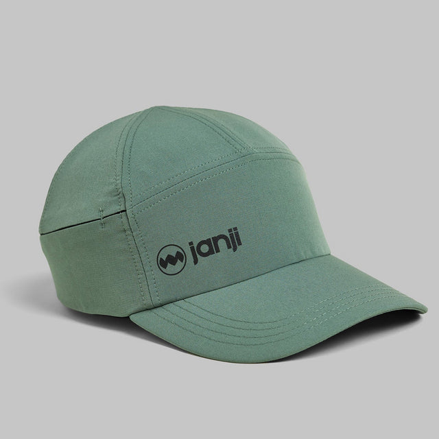 Janji Transit Tech Cap lightweight running hat in color spruce green