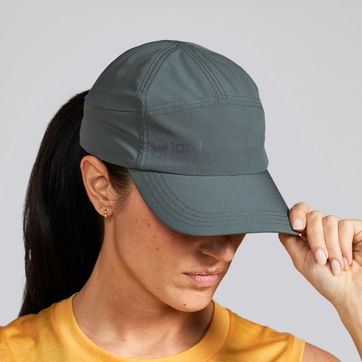 Janji Transit Tech Cap lightweight running hat
