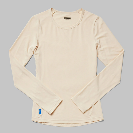 Janji women's circa daily long sleeve running shirt in moonglow color