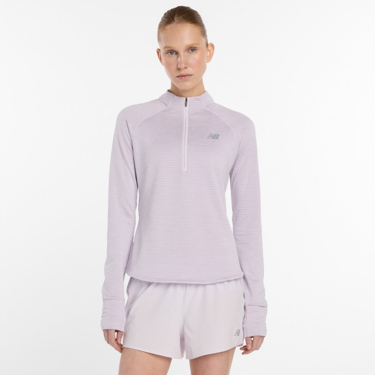 New Balance Women's Athletics Heat Grid 1/2 Zip long sleeve insulated running top

