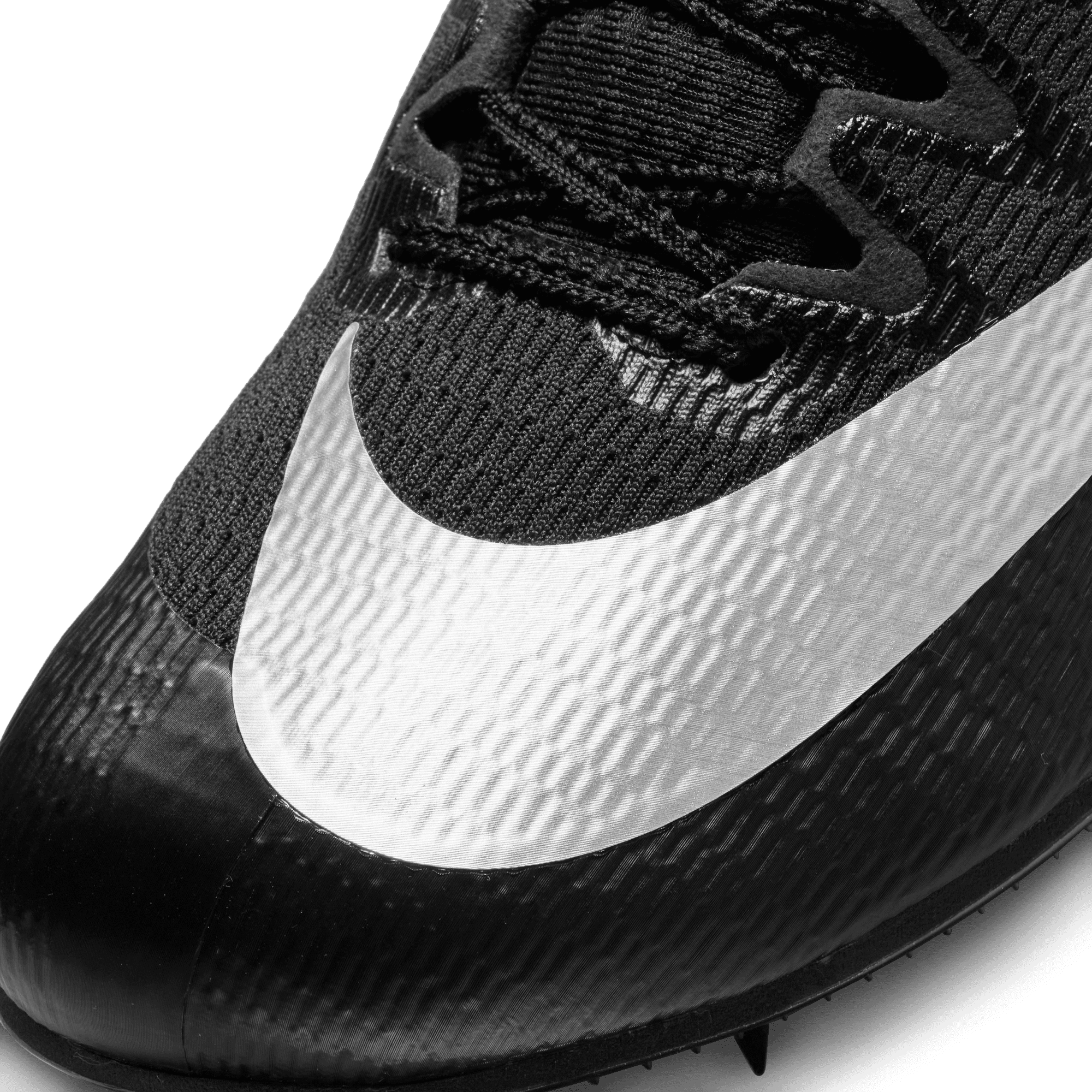 black and white nike track spikes