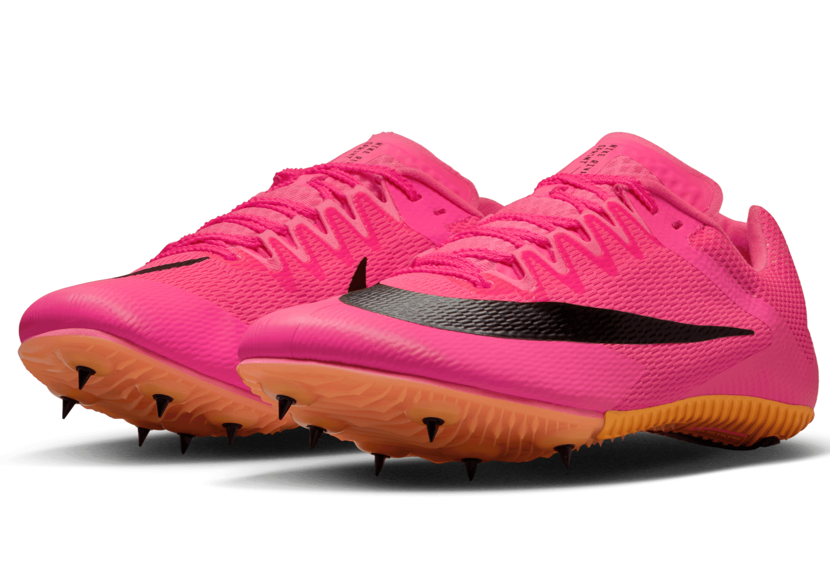 Pink best sale nike spikes